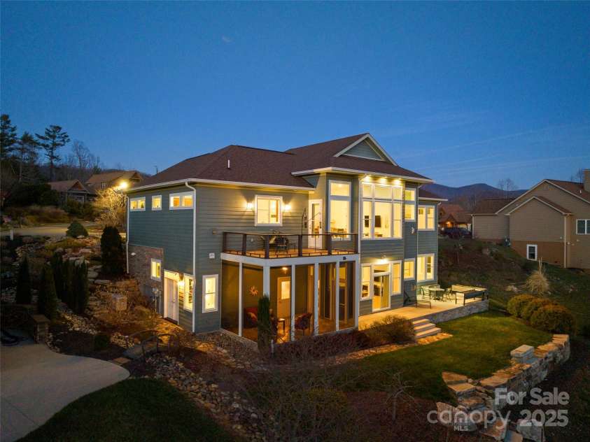 14 Al Dorf Drive, Weaverville, NC 28787.  MLS# CAR4238293, YatesRealty ID 9254. Backyard boasts custom rockwork and fruit trees.