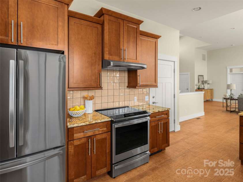 14 Al Dorf Drive, Weaverville, NC 28787.  MLS# CAR4238293, YatesRealty ID 9254. Chef's kitchen adorned with induction cooktop.