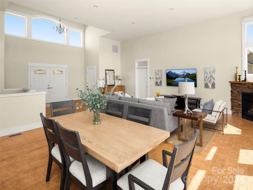 14 Al Dorf Drive, Weaverville, NC 28787.  MLS# CAR4238293, YatesRealty ID 9254. High ceilings create a vast living room layout.