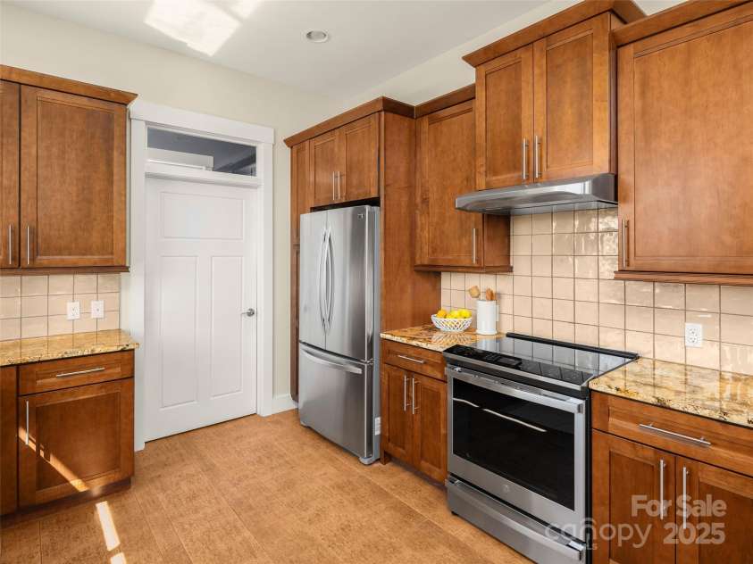 14 Al Dorf Drive, Weaverville, NC 28787.  MLS# CAR4238293, YatesRealty ID 9254. Laundry room behind the white door for ease of main level living.