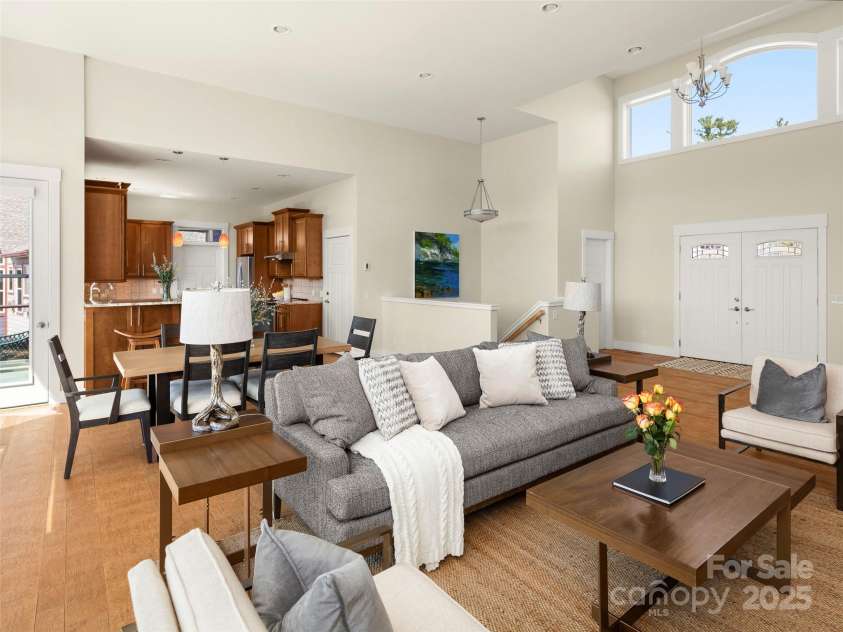 14 Al Dorf Drive, Weaverville, NC 28787.  MLS# CAR4238293, YatesRealty ID 9254. Open floorplan blends living room, dining room and kitchen seamlessly.