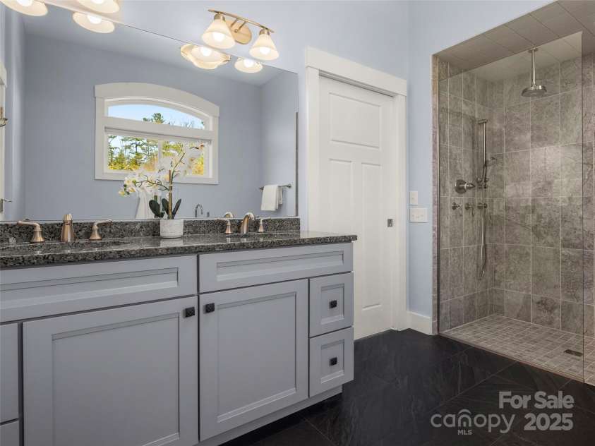 14 Al Dorf Drive, Weaverville, NC 28787.  MLS# CAR4238293, YatesRealty ID 9254. Primary en-suite bathroom.