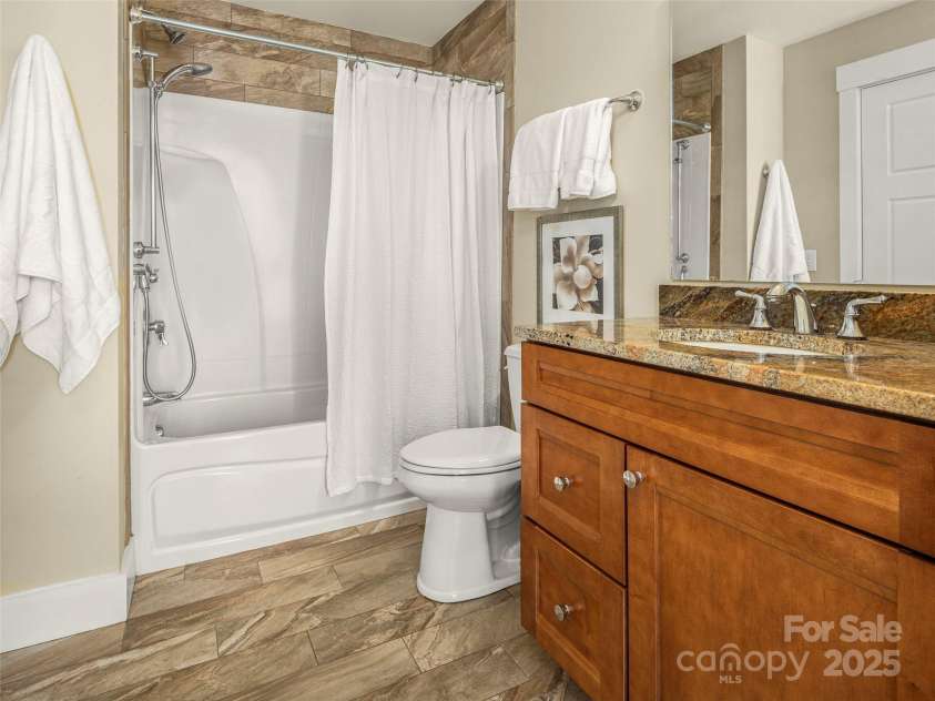 14 Al Dorf Drive, Weaverville, NC 28787.  MLS# CAR4238293, YatesRealty ID 9254. Terrace level full bathroom.