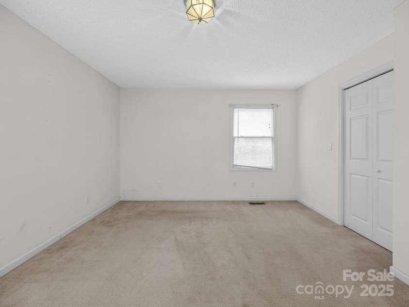 383 Woody Circle, Tryon, NC 28782.  MLS# CAR4322655, YatesRealty ID 9256. 