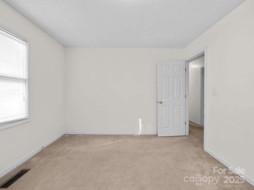 383 Woody Circle, Tryon, NC 28782.  MLS# CAR4322655, YatesRealty ID 9256. 