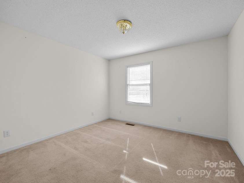 383 Woody Circle, Tryon, NC 28782.  MLS# CAR4322655, YatesRealty ID 9256. 