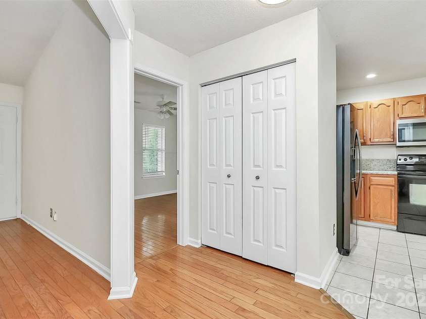 9232 Four Mile Creek Road, Charlotte, NC 28277.  MLS# CAR4253018, YatesRealty ID 9258. Breezeway to Kitchen and Bedrooms