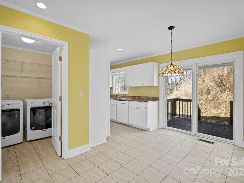 272 Paint Fork Road, Barnardsville, NC 28709.  MLS# CAR4225588, YatesRealty ID 9264. Dining Area & Laundry Room