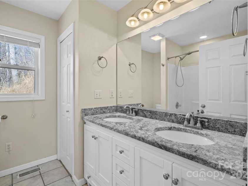 272 Paint Fork Road, Barnardsville, NC 28709.  MLS# CAR4225588, YatesRealty ID 9264. Primary Bath on the Main Level