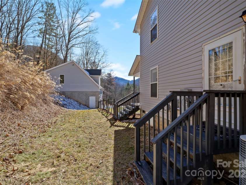 272 Paint Fork Road, Barnardsville, NC 28709.  MLS# CAR4225588, YatesRealty ID 9264. Side Yard