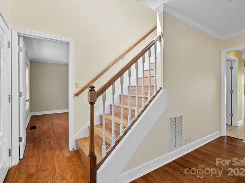 272 Paint Fork Road, Barnardsville, NC 28709.  MLS# CAR4225588, YatesRealty ID 9264. Stairs to the Upper Level