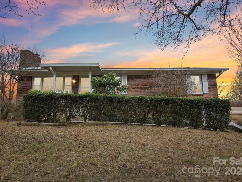 403 Crest Road, East Flat Rock, NC 28726.  MLS# CAR4230629, YatesRealty ID 9266. 