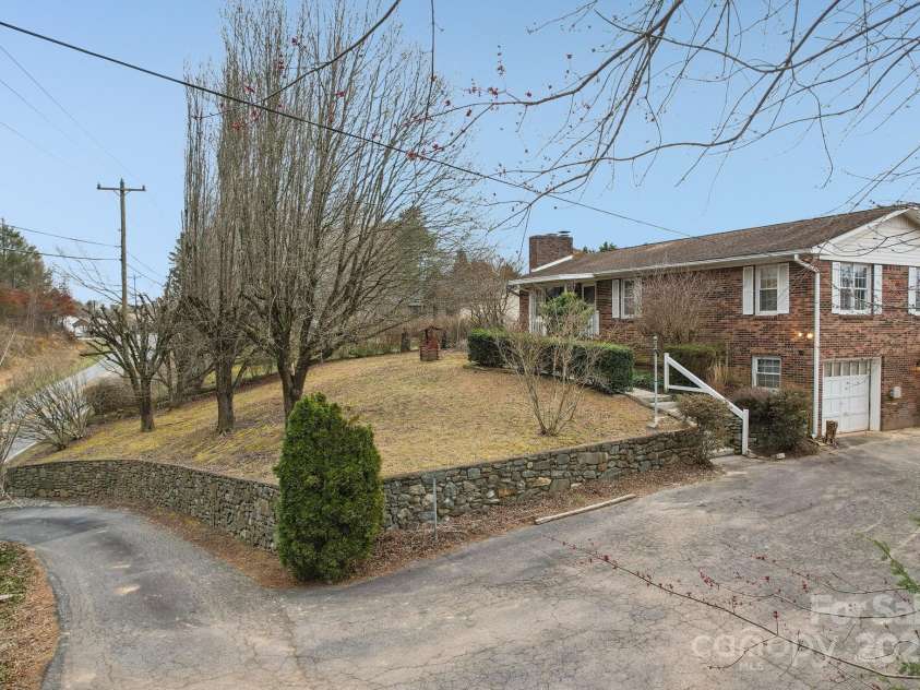 403 Crest Road, East Flat Rock, NC 28726.  MLS# CAR4230629, YatesRealty ID 9266. 