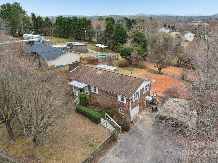 403 Crest Road, East Flat Rock, NC 28726.  MLS# CAR4230629, YatesRealty ID 9266. 