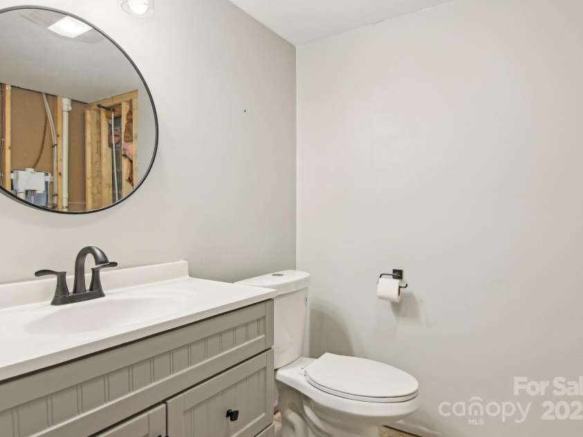 403 Crest Road, East Flat Rock, NC 28726.  MLS# CAR4230629, YatesRealty ID 9266. Unfinished Bathroom in Garage