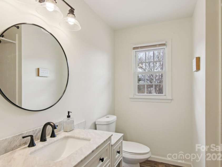 403 Crest Road, East Flat Rock, NC 28726.  MLS# CAR4230629, YatesRealty ID 9266. Updated Guest bathroom