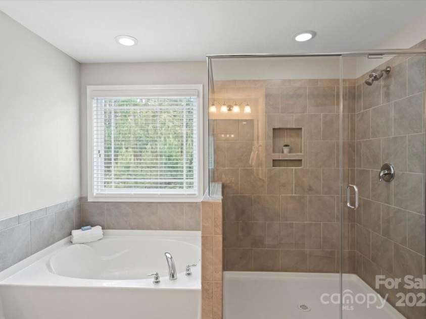 7039 Chrysanthemum Road, Lancaster, SC 29720.  MLS# CAR4249238, YatesRealty ID 9267. Primary Bathroom