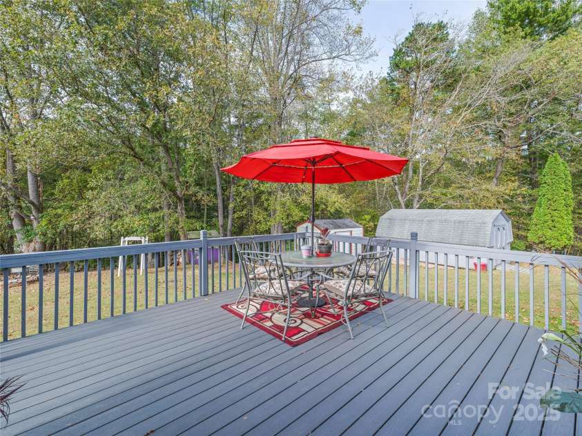 8124 Boylston Highway, Mills River, NC 28759.  MLS# CAR4184875, YatesRealty ID 9269. Back deck