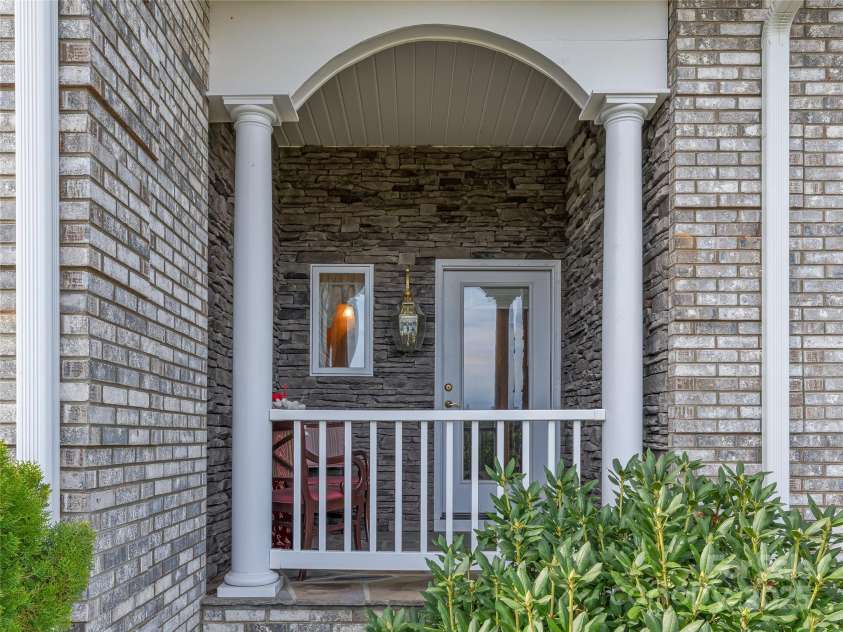 8124 Boylston Highway, Mills River, NC 28759.  MLS# CAR4184875, YatesRealty ID 9269. Third front porch