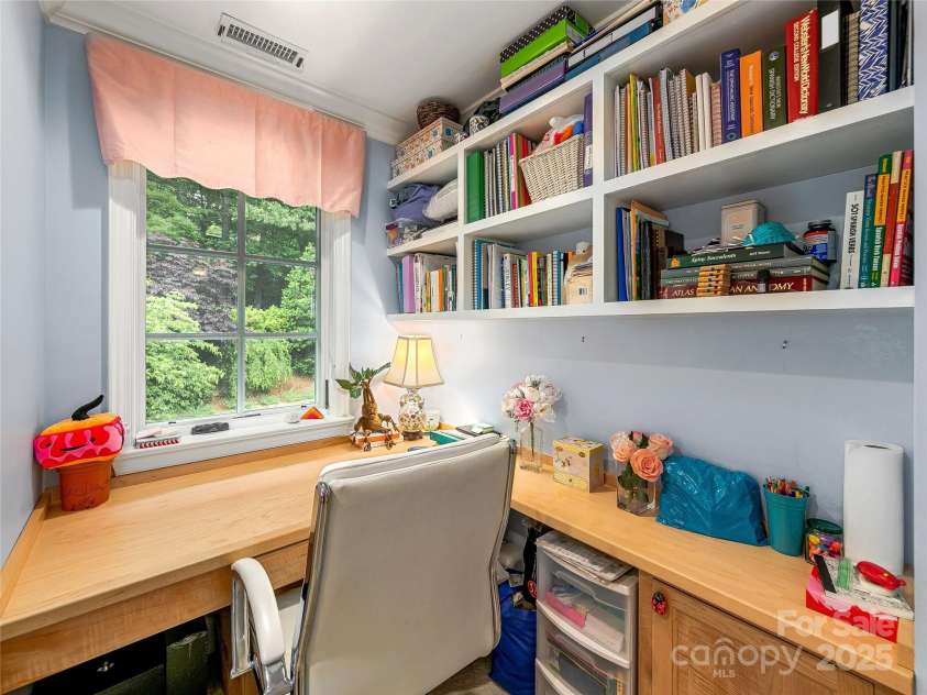 51 Robinhood Road, Asheville, NC 28804.  MLS# CAR4203746, YatesRealty ID 927. Great place to work overlooking beautiful landscaping