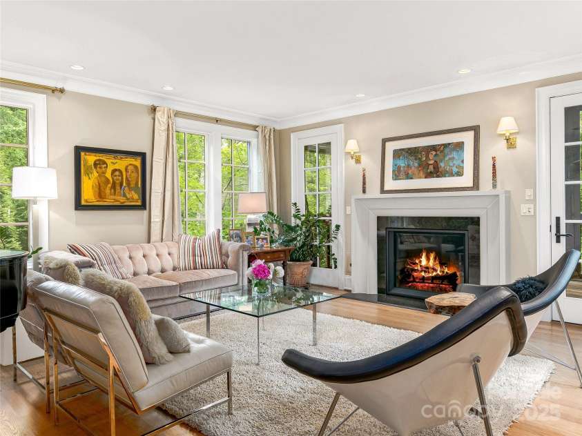 51 Robinhood Road, Asheville, NC 28804.  MLS# CAR4203746, YatesRealty ID 927. LIving room with gas Fireplace and access to Screen porch