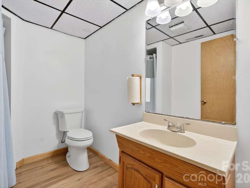 63 Independence Boulevard, Asheville, NC 28805.  MLS# CAR4347392, YatesRealty ID 9270. Downstairs bathroom