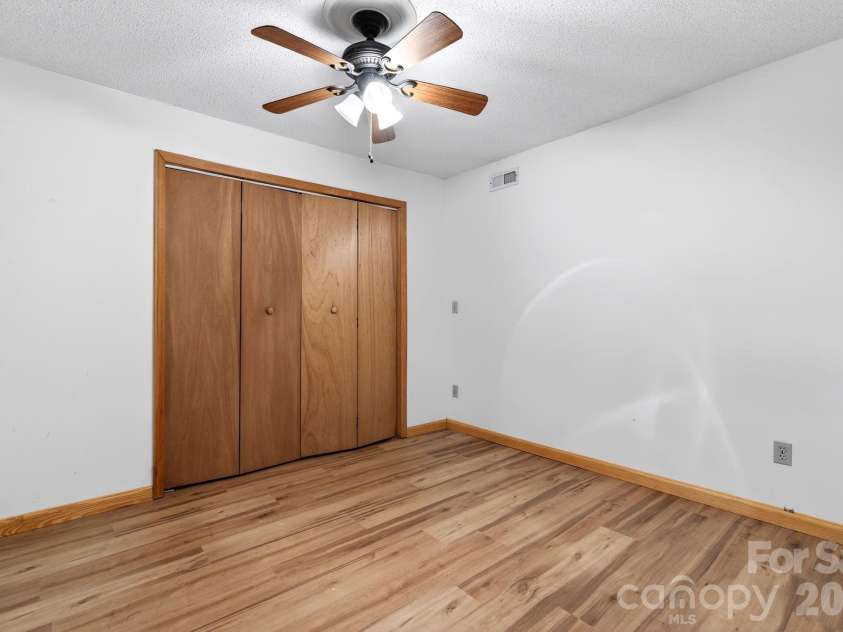 63 Independence Boulevard, Asheville, NC 28805.  MLS# CAR4347392, YatesRealty ID 9270. Downstairs bouns room