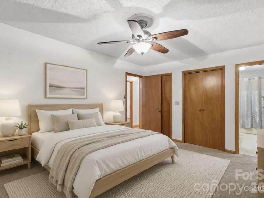 63 Independence Boulevard, Asheville, NC 28805.  MLS# CAR4347392, YatesRealty ID 9270. Virtually staged primary bedroom