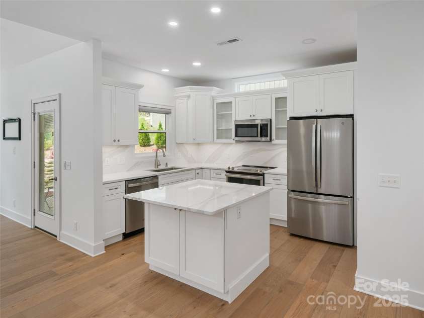 241 Millbrae Loop, Hendersonville, NC 28791.  MLS# CAR4266188, YatesRealty ID 9271. Kitchen With Cambria Quartz Counters & Backsplash