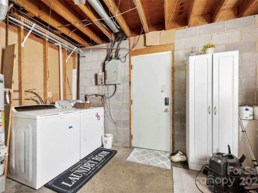 1308 Gaston Way, Dallas, NC 28034.  MLS# CAR4240422, YatesRealty ID 9272. Unheated laundry area and exit to backyard