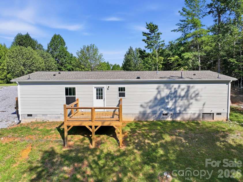 90 Cascades Drive, Nebo, NC 28761.  MLS# CAR4354878, YatesRealty ID 9277. House rear 2