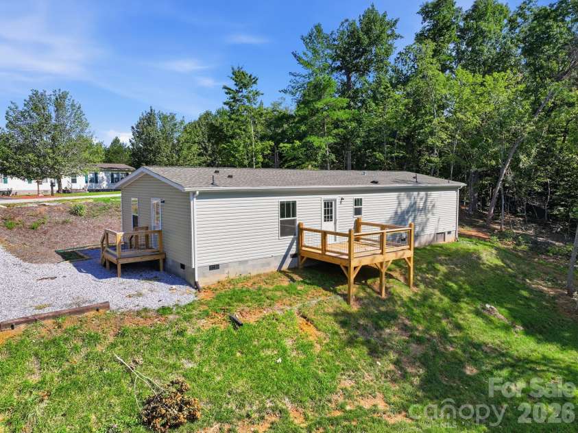 90 Cascades Drive, Nebo, NC 28761.  MLS# CAR4354878, YatesRealty ID 9277. House rear