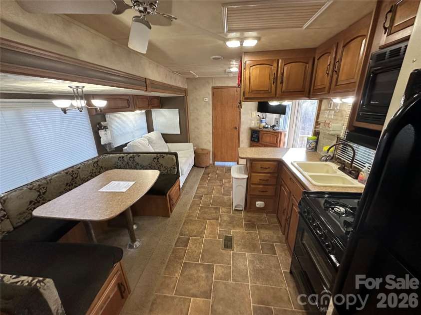 121 Sparrow Lane, New London, NC 28127.  MLS# CAR4335791, YatesRealty ID 928. 