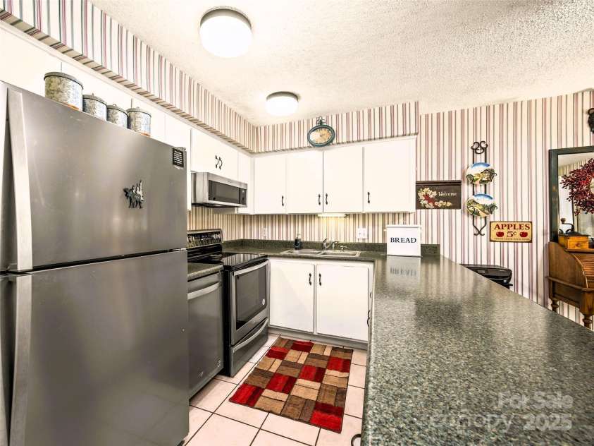 118 West Lake Drive, Lake Lure, NC 28746.  MLS# CAR4247431, YatesRealty ID 9280. 