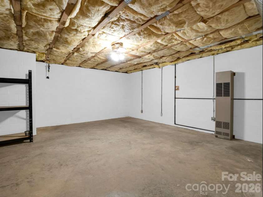 25 Coldwater Lane, Laurel Park, NC 28739.  MLS# CAR4350806, YatesRealty ID 9283. Large workshop/flex space/playroom - heated