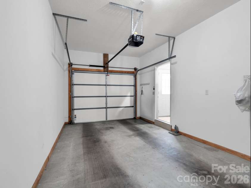25 Coldwater Lane, Laurel Park, NC 28739.  MLS# CAR4350806, YatesRealty ID 9283. One014662u Car Garage