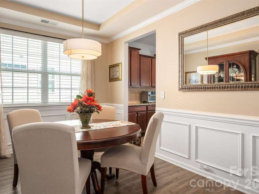 3020 Sewee Lane, Waxhaw, NC 28173.  MLS# CAR4356539, YatesRealty ID 9285. Lovely formal DR with Wainscoting & trey ceiling