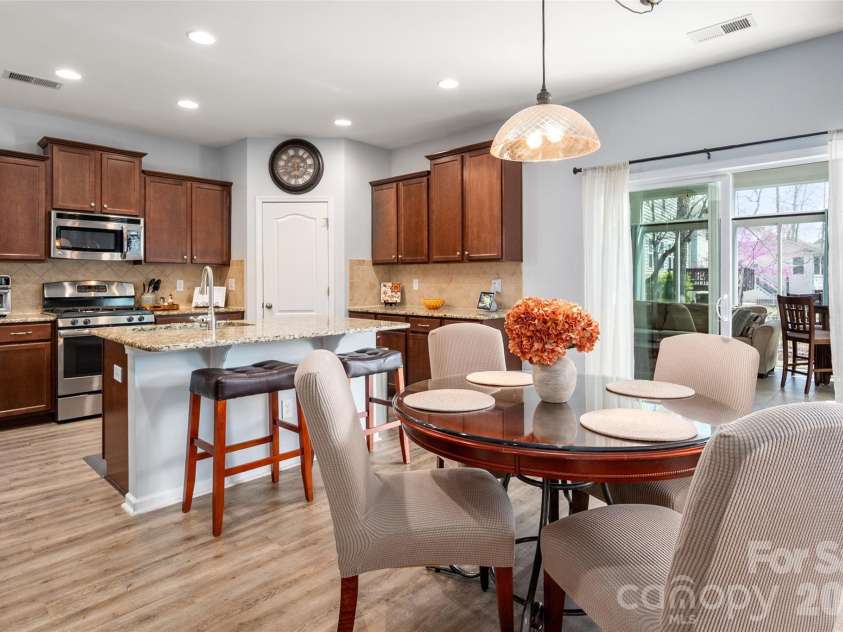 3020 Sewee Lane, Waxhaw, NC 28173.  MLS# CAR4356539, YatesRealty ID 9285. Open floor plan shows breakfast area & kitchen