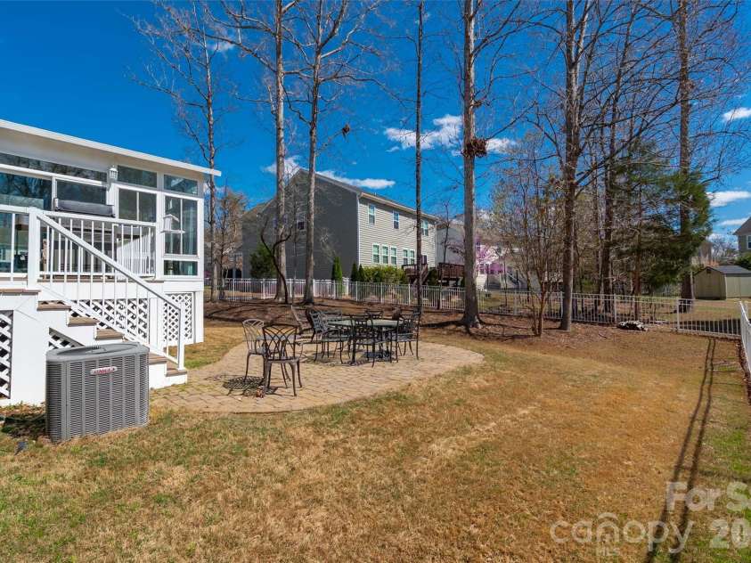 3020 Sewee Lane, Waxhaw, NC 28173.  MLS# CAR4356539, YatesRealty ID 9285. Right side view of backyard