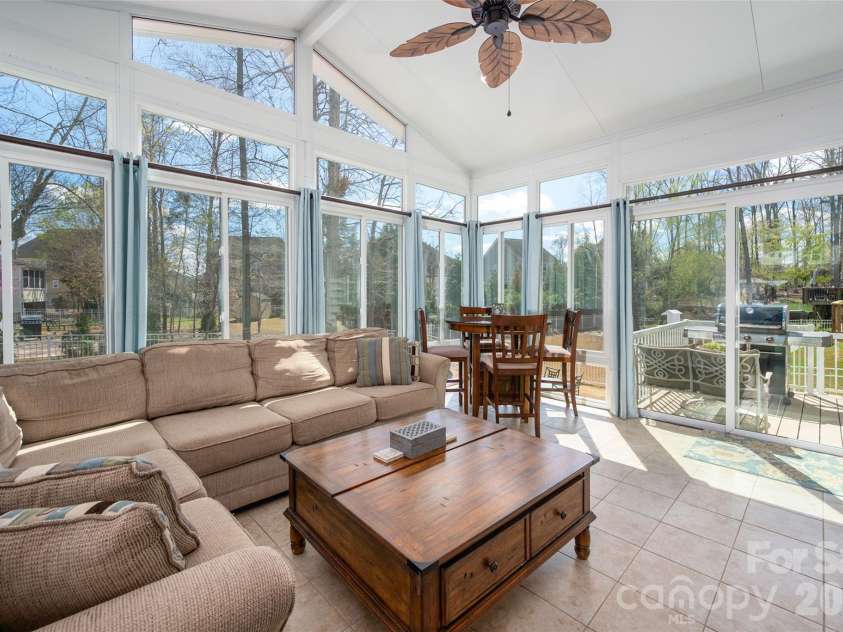 3020 Sewee Lane, Waxhaw, NC 28173.  MLS# CAR4356539, YatesRealty ID 9285. Sunroom leads to deck & backyard