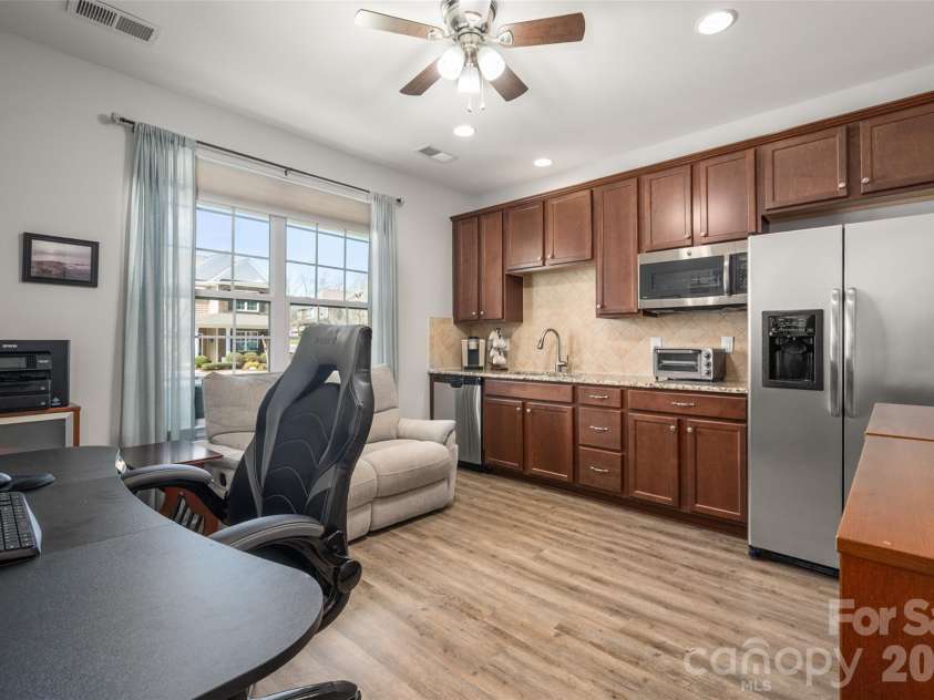 3020 Sewee Lane, Waxhaw, NC 28173.  MLS# CAR4356539, YatesRealty ID 9285. This flex room also has a mini kitchen - great for entertaining!
