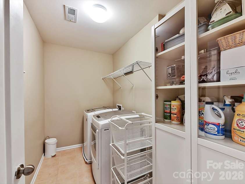 3020 Sewee Lane, Waxhaw, NC 28173.  MLS# CAR4356539, YatesRealty ID 9285. Upstairs laundry, cabinet remains