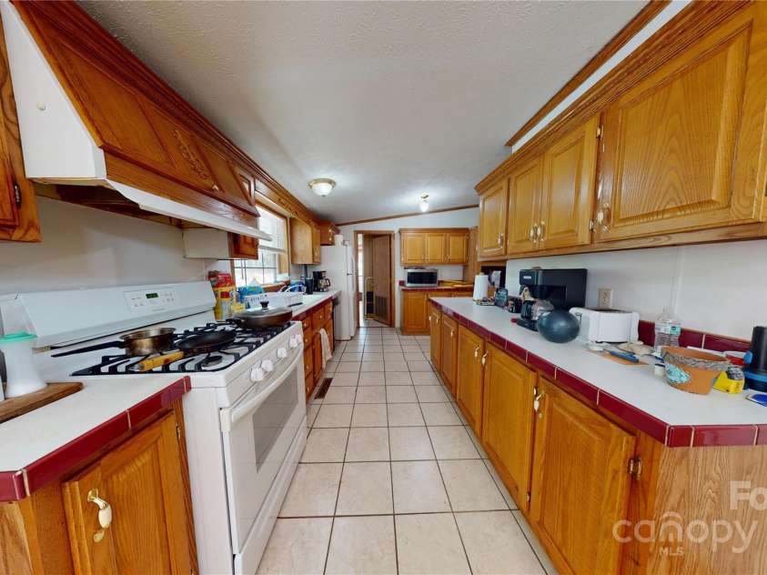 57 Sleepy Forest Drive, Leicester, NC 28748.  MLS# CAR4252537, YatesRealty ID 9287. 