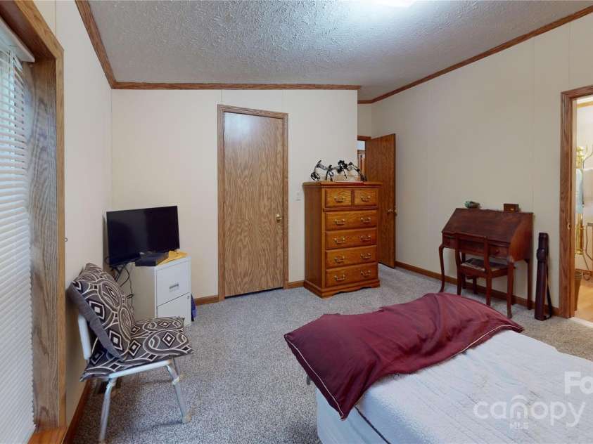 57 Sleepy Forest Drive, Leicester, NC 28748.  MLS# CAR4252537, YatesRealty ID 9287. 