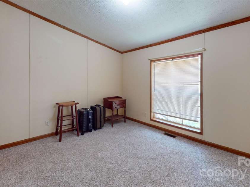 57 Sleepy Forest Drive, Leicester, NC 28748.  MLS# CAR4252537, YatesRealty ID 9287. 