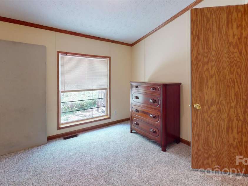 57 Sleepy Forest Drive, Leicester, NC 28748.  MLS# CAR4252537, YatesRealty ID 9287. 