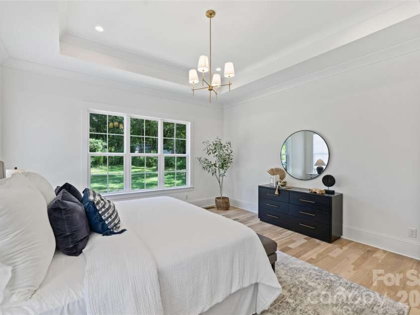 5010 Ohm Lane, Charlotte, NC 28270.  MLS# CAR4306618, YatesRealty ID 929. Primary bedroom