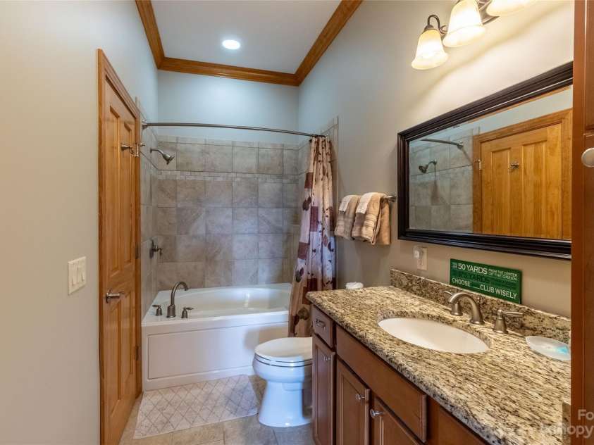 564 Sawgrass Drive, Whittier, NC 28789.  MLS# CAR4061417, YatesRealty ID 929. Guest Bathroom Ensuite