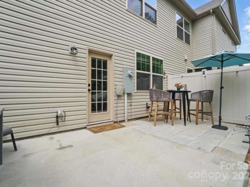 9424 Avery Lilac Lane, Fort Mill, SC 29707.  MLS# CAR4245112, YatesRealty ID 9294. Patio with Umbrella