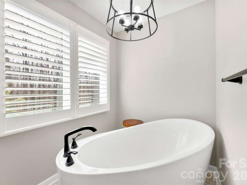 4242 John Ritchie Road, Iron Station, NC 28080.  MLS# CAR4350188, YatesRealty ID 9296. 2025 Primary Bathroom